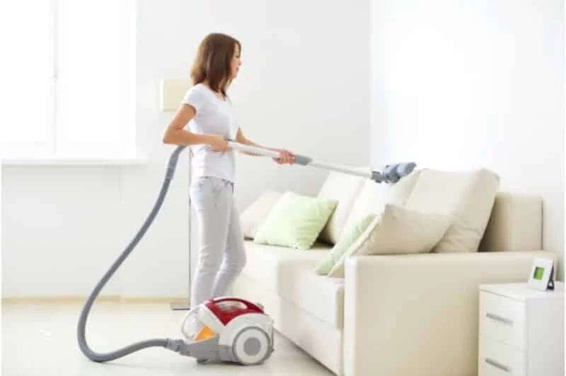 Girl using the Best Cordless Vacuum Cleaner in India