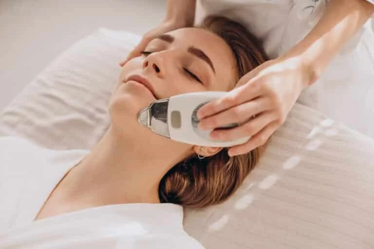 Woman having massage with the best full body massager machine